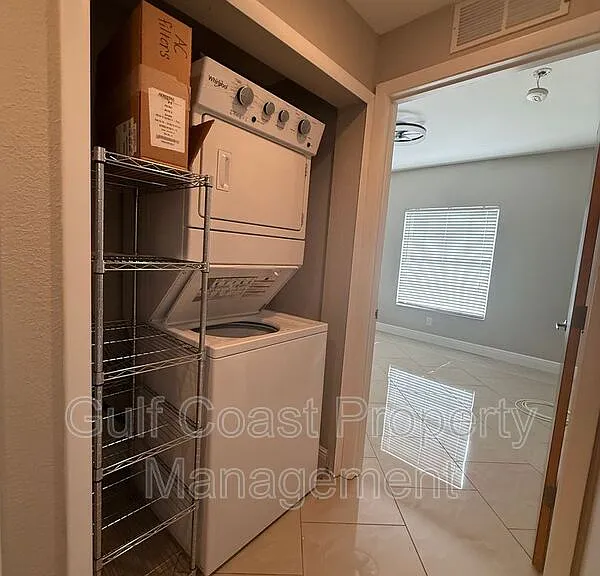 8555 Bernwood Cove Loop #103 — Photo 20