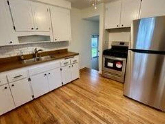 Kitchen with stainless steel appliances.