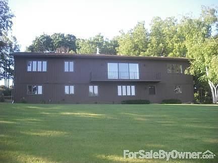 Back of House facing the lake : This picture is taken down by the lake.