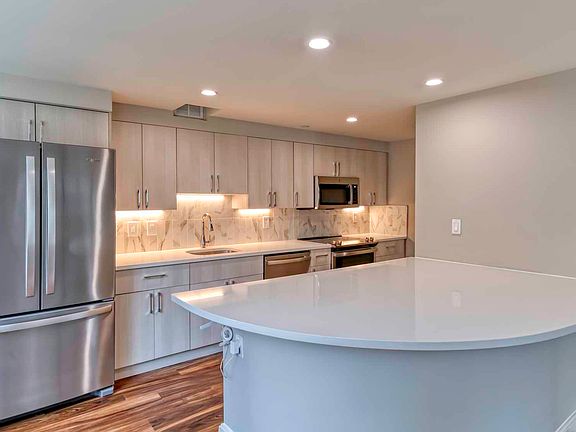 Select homes feature upgraded kitchens with quartz countertops