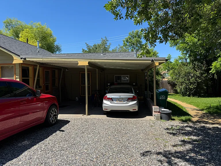Carport and parking space.