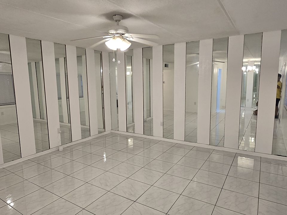 Living Room with mirror wall accents