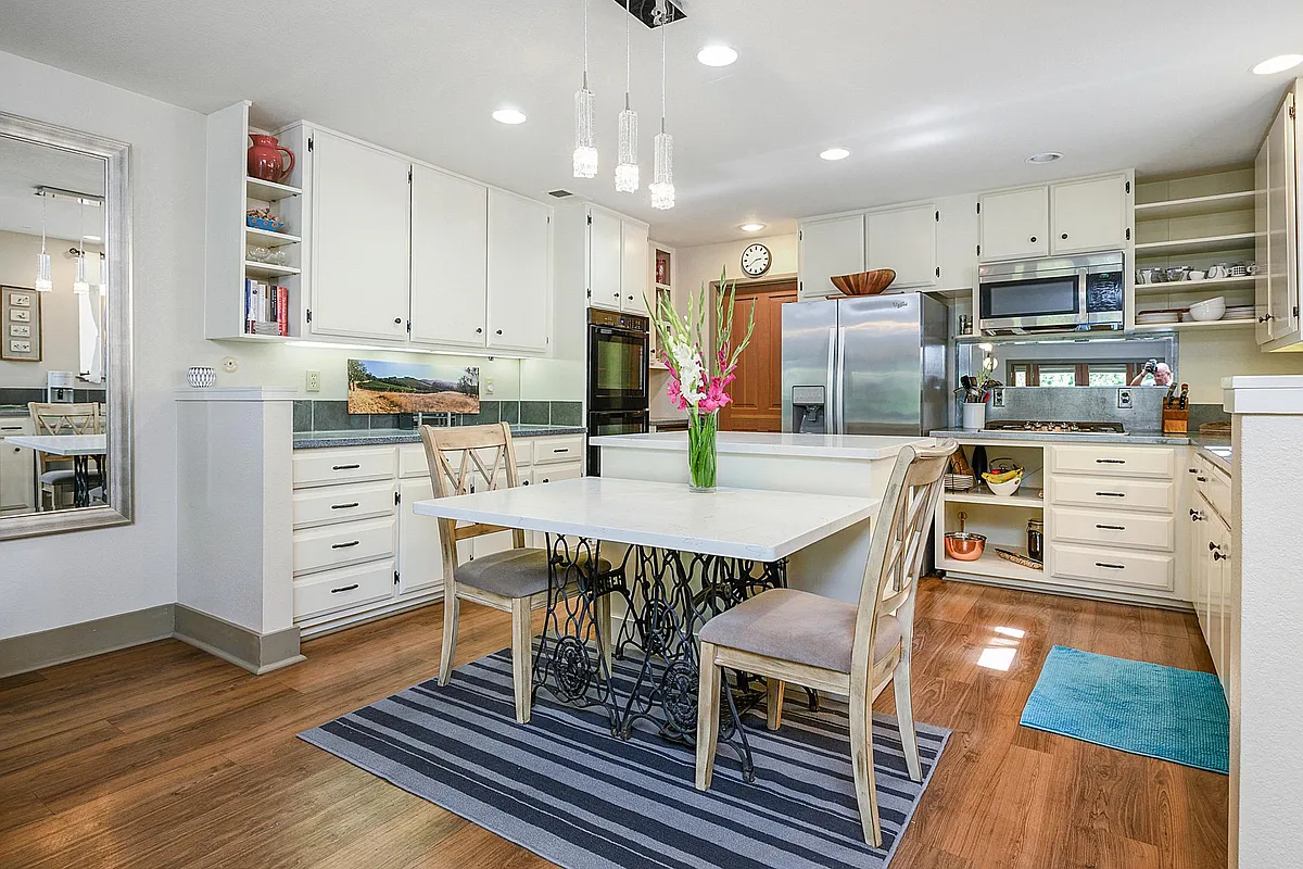 Renovated kitchen has everything you need, and is bright and spacious. - 1220 Peppertree Cir
