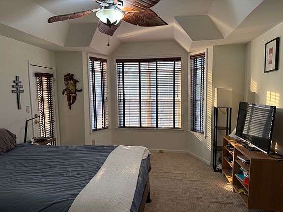 Primary Bedroom featuring alcove