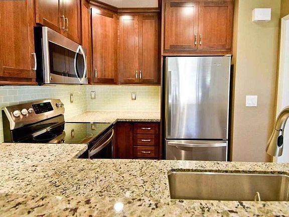 A view from the dining room into the kitchen area.