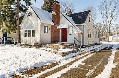 Home with driveway back to garage