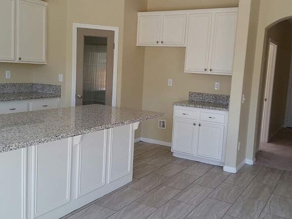 Kitchen. Brand new granite countertops throughout!