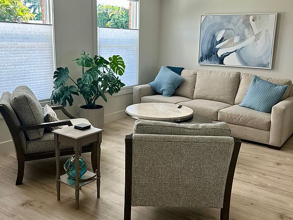 Living room with 75" HD television.