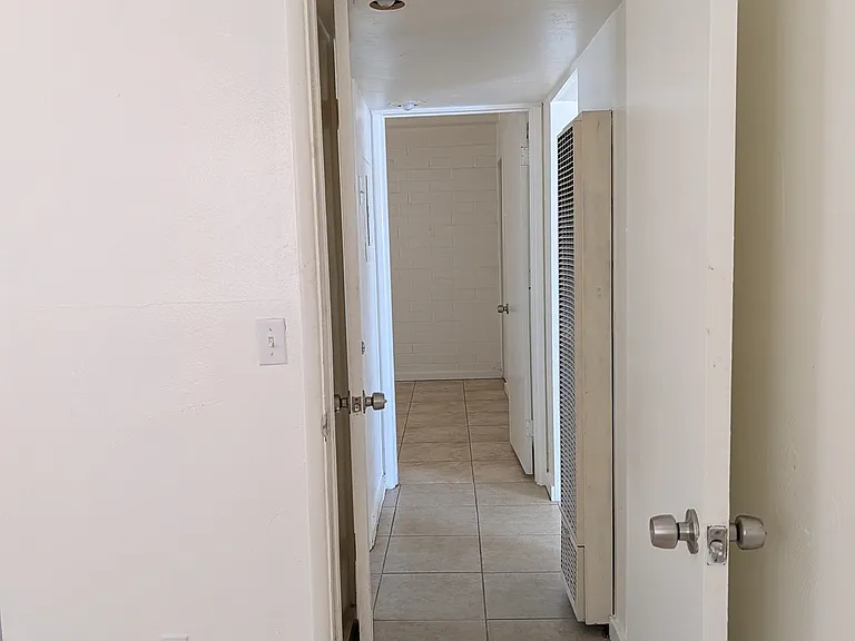 Hallway with bathroom