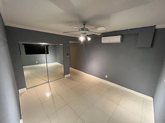 Spacious primary bedroom with private bathroom