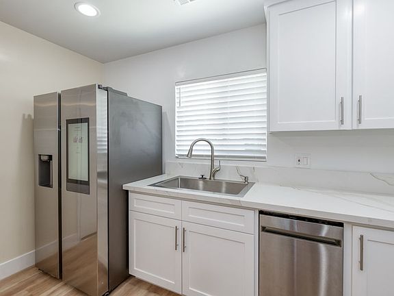 Luxury Kitchen & Appliances, LVP Flooring, Dual Pane Windows.
