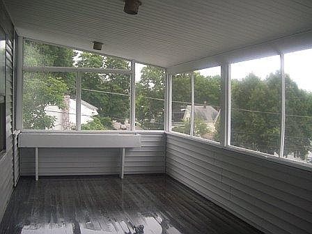 Screened porch offering privacy and gentle breezes from hillside