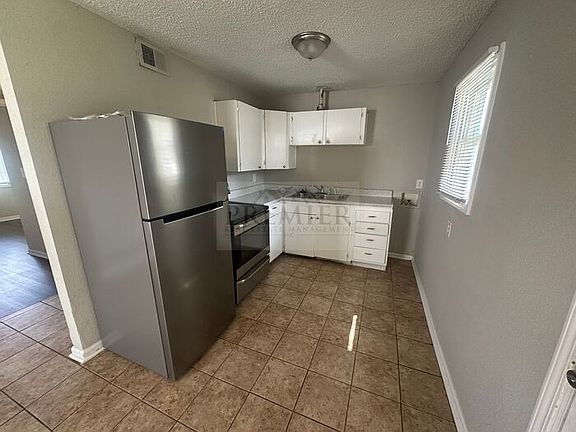 2nd image of 6108 E 153rd Ter APT A