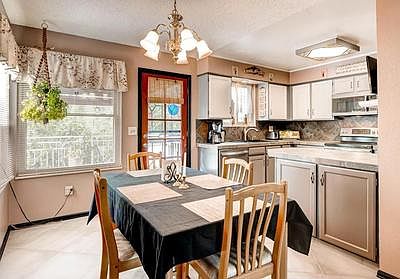 Large Dining Area Adjacent to Kitchen & Living Room