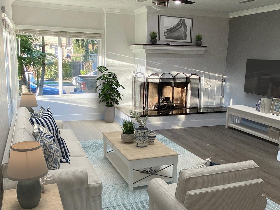 Open and large living room with working fireplace