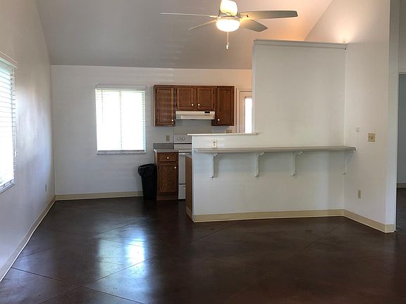 Living area and kitchen as seen from the front entrance
