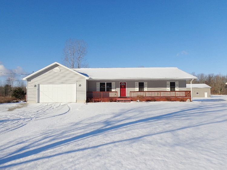 FABULOUS RANCH BUILT IN 2007 BY WALLACE BUILDERS. Desirable finished 24x36 attached garage. One acre lot with plenty of room to put a pole barn. Front covered porch. Gas log fireplace in the living room. Hot tub room off the deck. Full, nicely finished basement with brand new carpeting, large recreation room, office, full bathroom and plenty of storage. City water and the assessment has already been paid. Midland Schools.