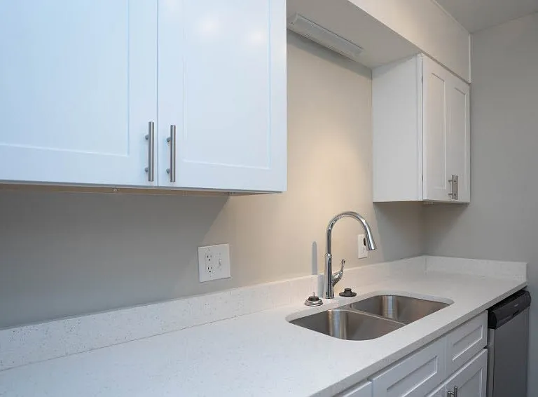 Elevate your lifestyle at Richmond Hills Apartments, where modern kitchens feature sleek white cabinetry and elegant countertops. Enjoy a space designed for comfort and style. Schedule a tour today and see your future home!
