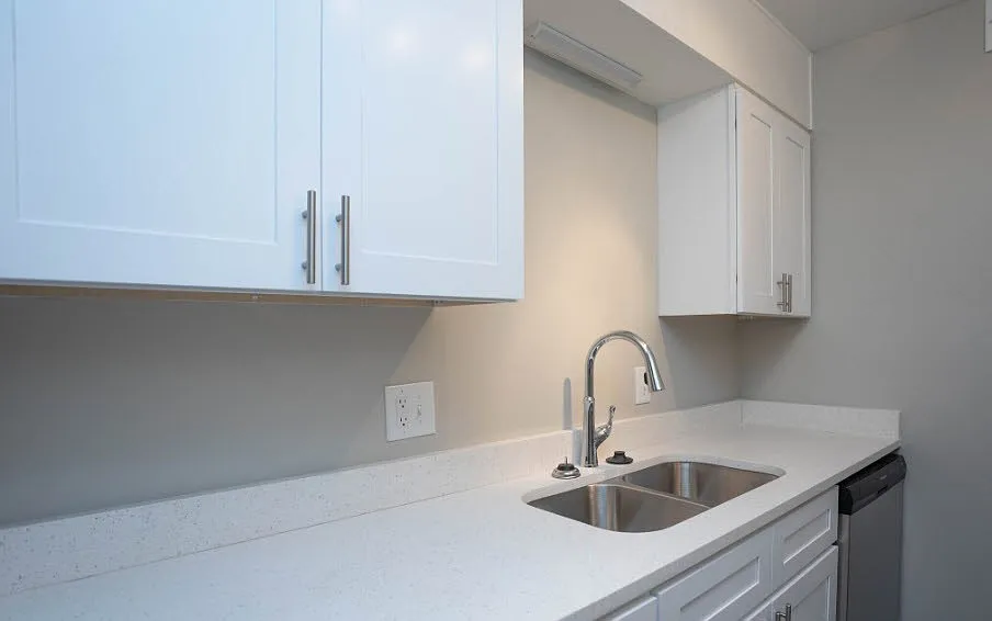 Elevate your lifestyle at Richmond Hills Apartments, where modern kitchens feature sleek white cabinetry and elegant countertops. Enjoy a space designed for comfort and style. Schedule a tour today and see your future home!