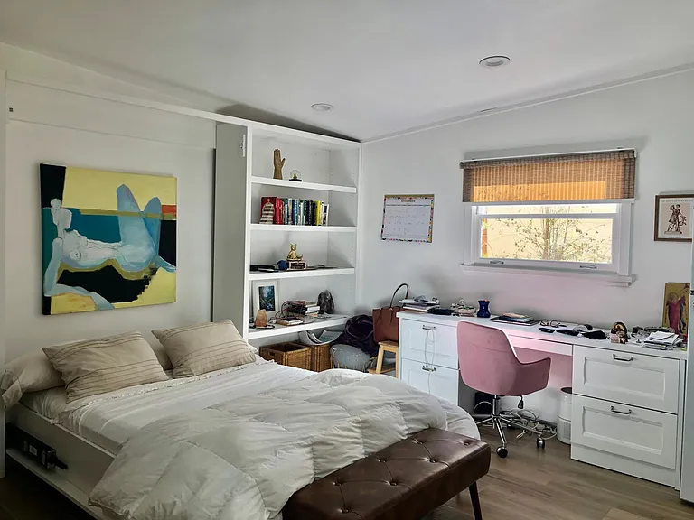 murphy bed, desk and book shelves