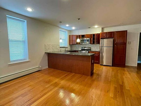 4th image of 8686 15th Ave #2R