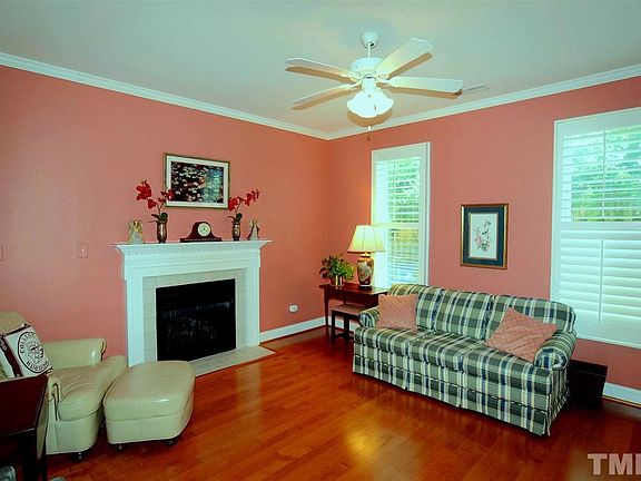 Living Room has a Tile Surround Gas Fireplace, Decorative Mantle & Ceiling Fan. Through out the Home you will find Plantation Shutters, Plantation Blinds & Ceiling Fans. Hardwoods are in the Foyer, Living Room, Dining, Kitchen & Eat-in Area.