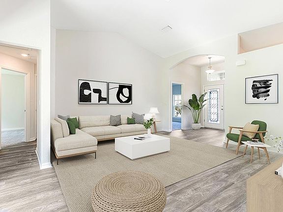 Welcoming and open gathering room with volume ceiling - Remington IV home plan by Highland Homes