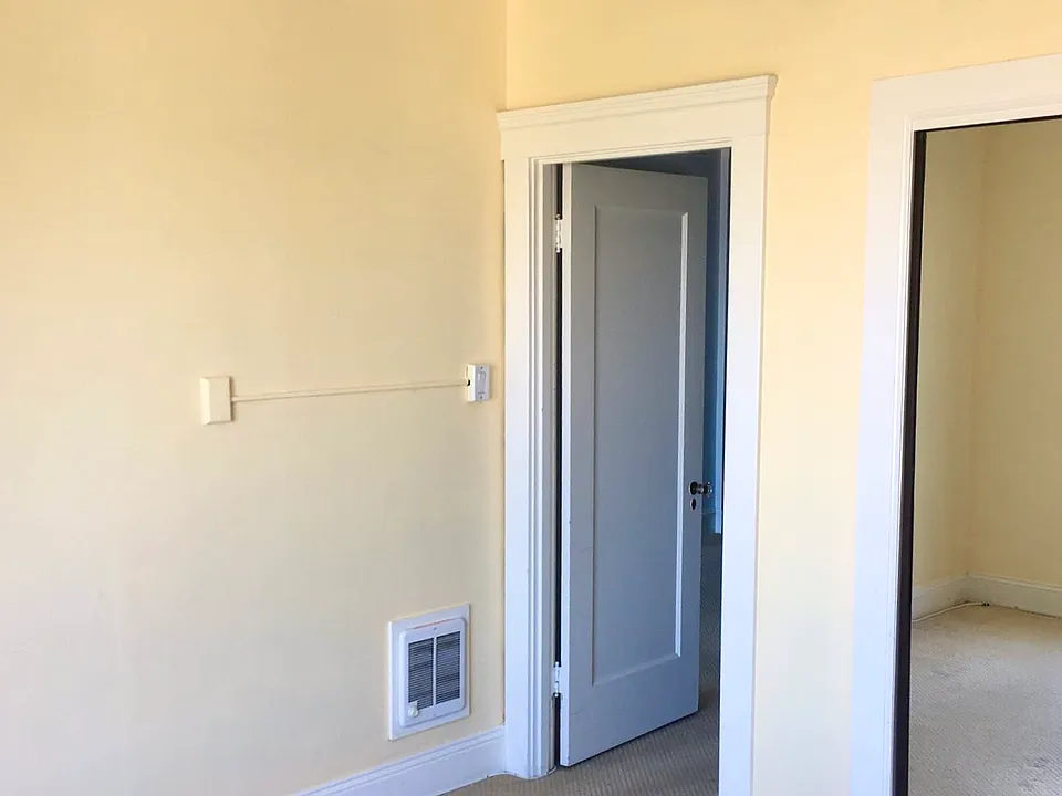 Entrance to bedroom and long wall closet