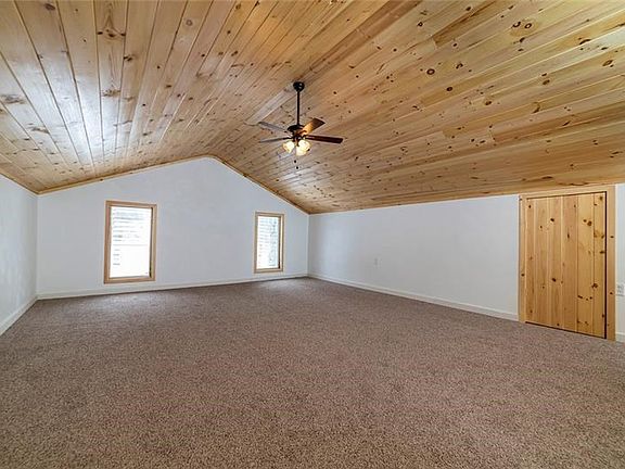 MASTER BEDROOM [23X21] WITH VAULTED PINE CEILING
