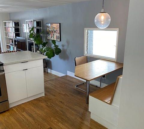 Kitchen, with built-in dining table and storage bench