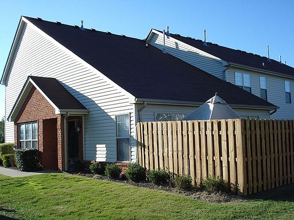 VIEW OF BACK FENCE PRIVATE PATIO