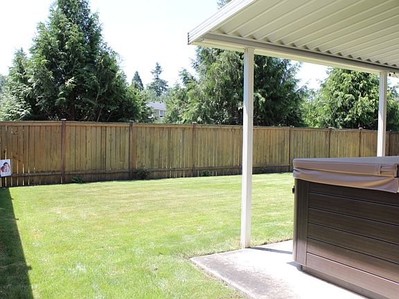 Trees line the property