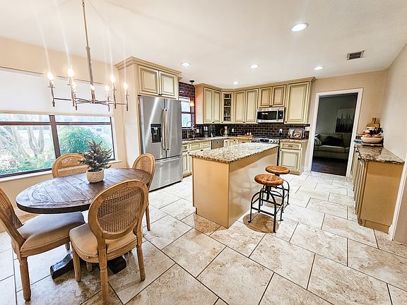 Large kitchen with breakfast area plus additional dining room