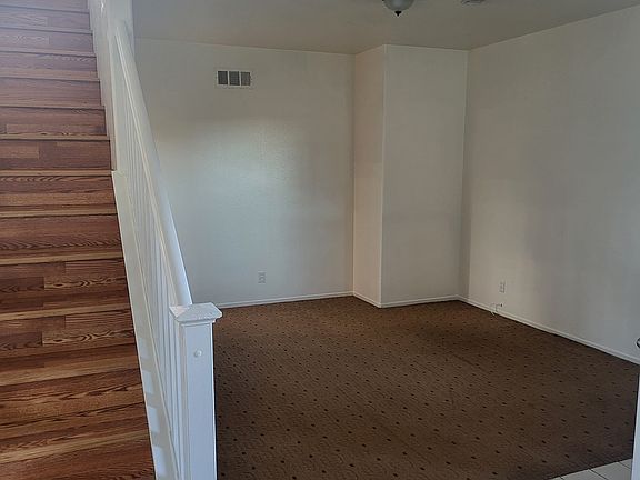 Dining area which connects to the kitchen, half bath, laundry area and garage.