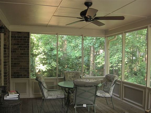 Screened porch faces south.  Sunny in winter, shaded in summer.