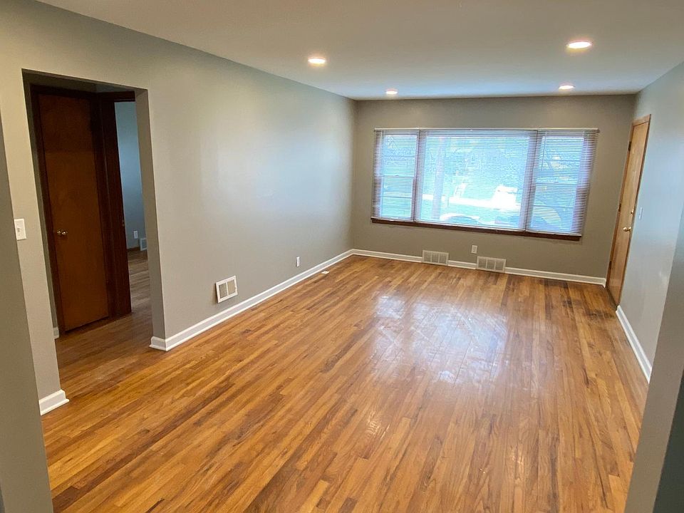 Great lighting in living room with views of the park