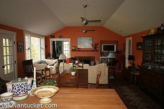 View towards fireplace  over Kitchen center island across to living and dining space