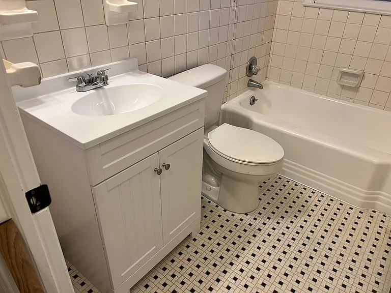 New vanity and refurbished heavy duty tub.