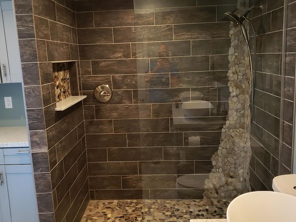 Custom tile shower surround with dual shower heads