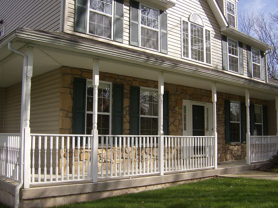 Stone Front & Wraparound Porch