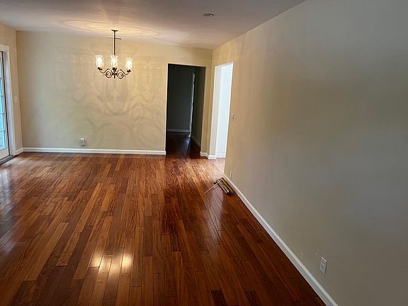 Living room dining room open floor plan, hardwood flooring