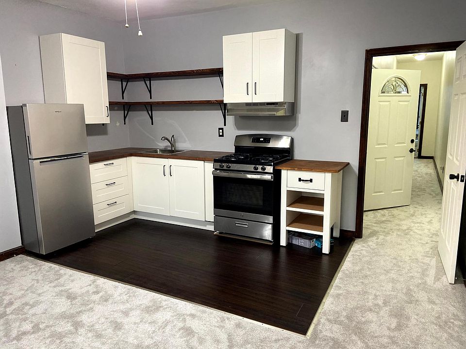 Brand new kitchen and flooring, oak butcherblock countertops.