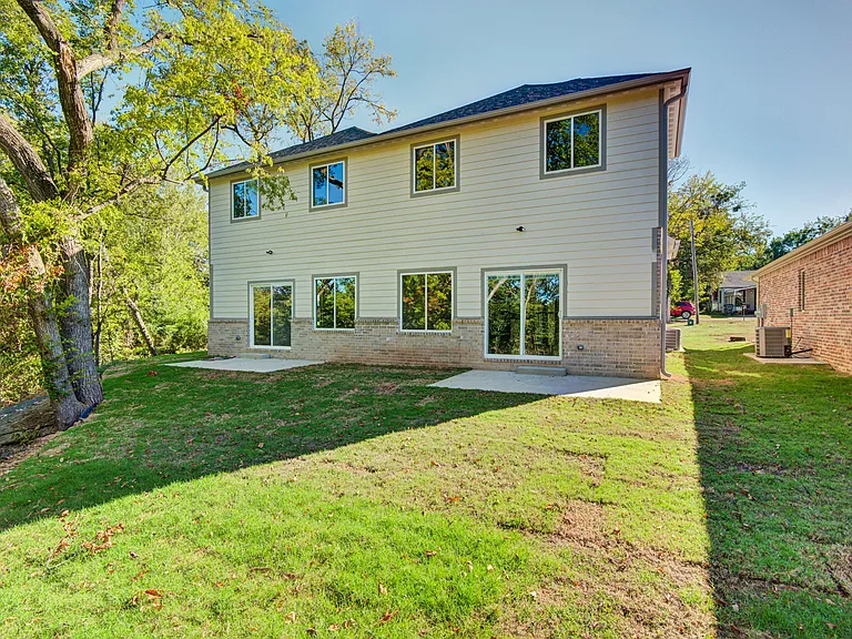 Backyard. It is currently fenced in separately for both units. (Not shown)