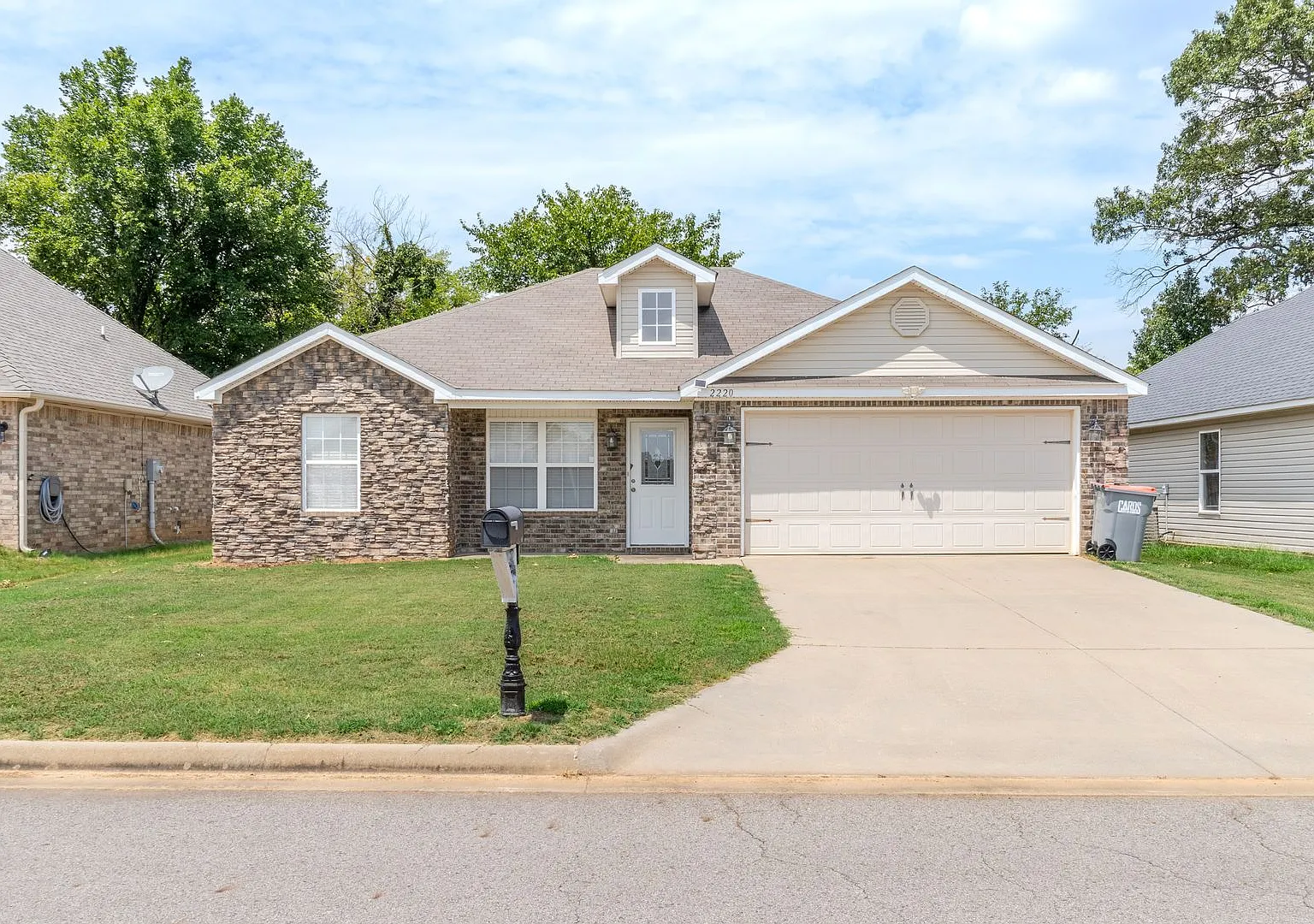 Secure Comfort: Beautiful 3 Bed, 2 Bath Home with a 2-Car Garage! — Photo 1