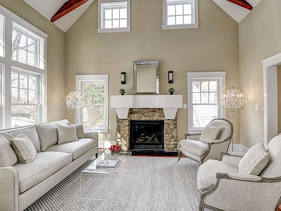 Stunning Light Filled Living Room with Vaulted Ceiling