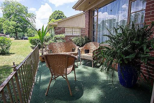 Porch is left of the front door