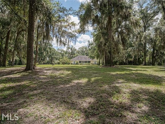 Great back yard that features large Oak Trees, Fruit Trees.  There is lots of privacy to enjoy views of the wildlife that come by including deer and birds!