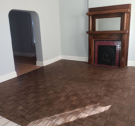 Living room freshly painted. Parkay floor original