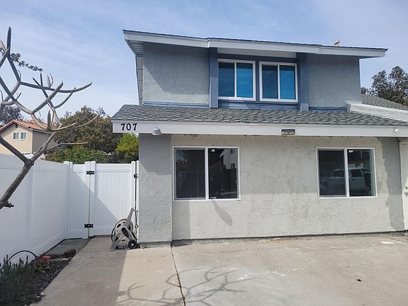 Entry to the unit on the side of the house