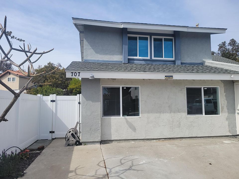 Entry to the unit on the side of the house